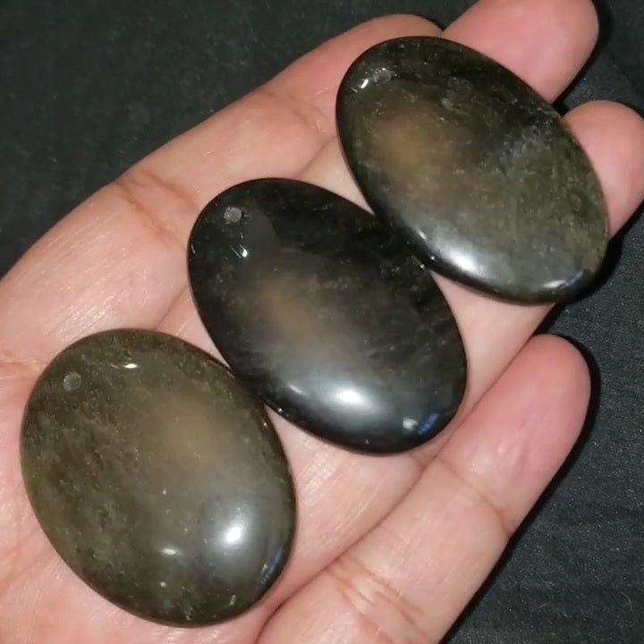 ​Natural Golden-Black Obsidian DRILLED Pendant Beads. Length range is 39 to 41mm