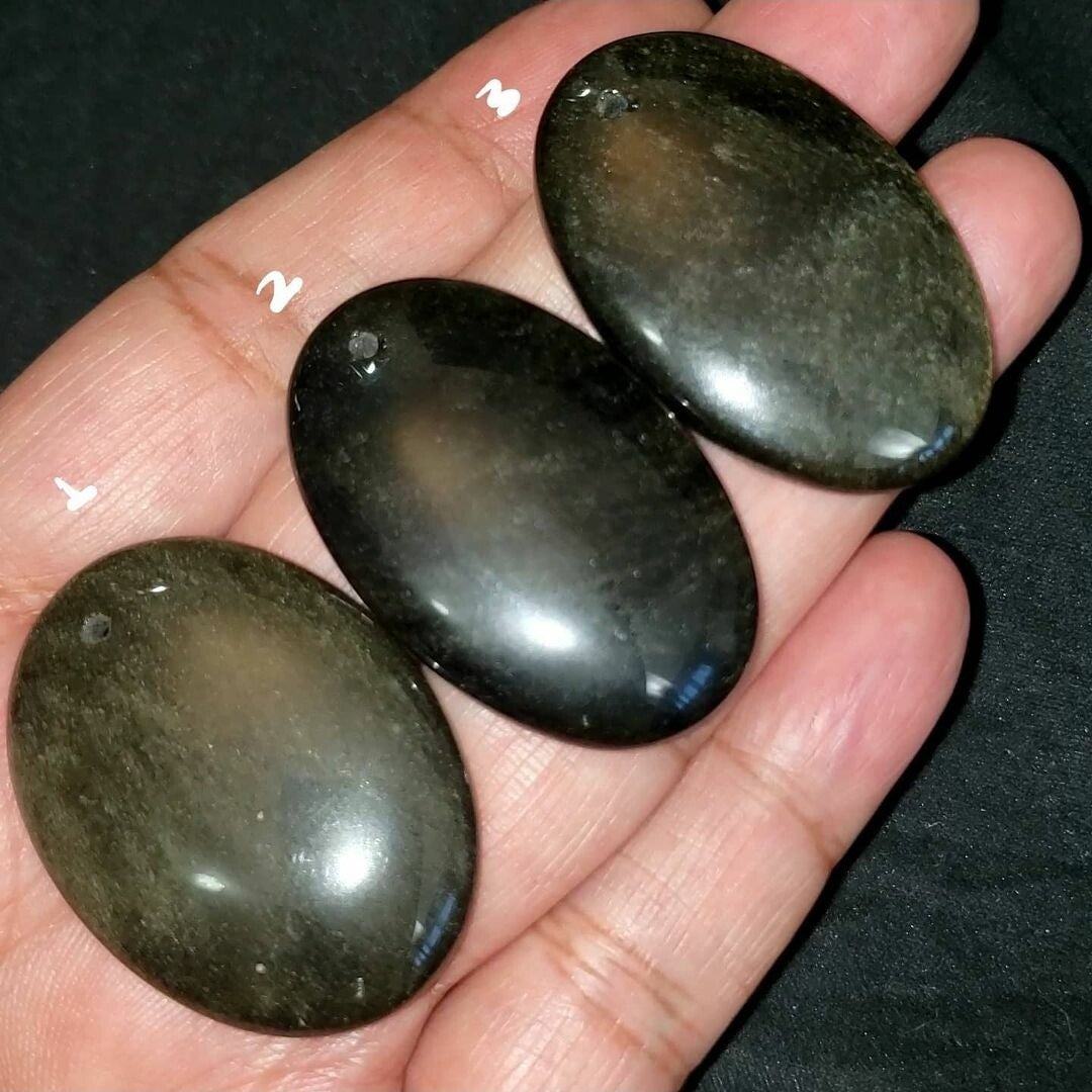 ​Natural Golden-Black Obsidian DRILLED Pendant Beads. Length range is 39 to 41mm