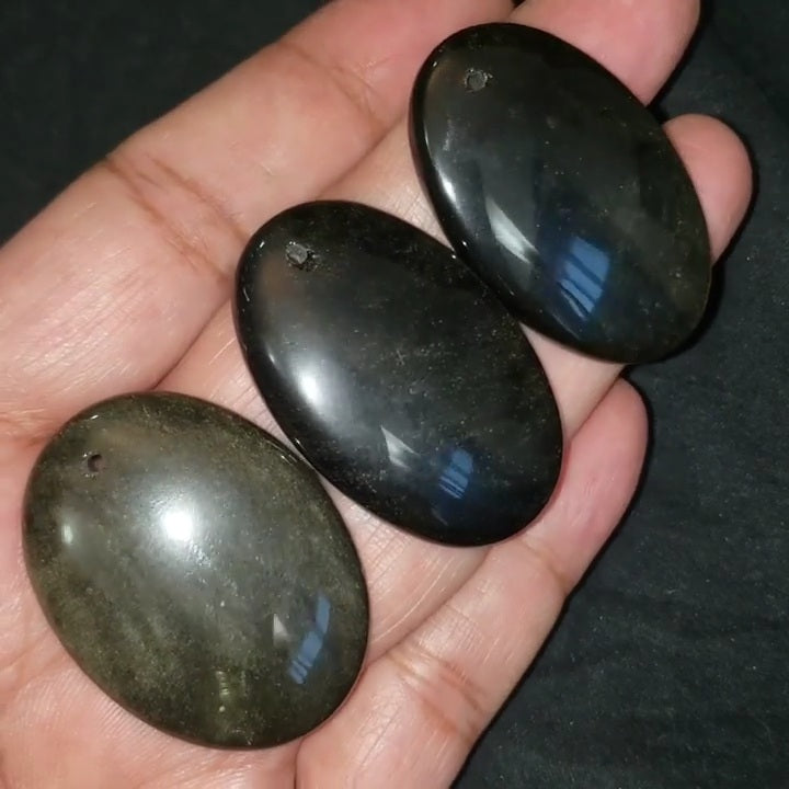 ​Natural Golden-Black Obsidian DRILLED Pendant Beads. Length range is 39 to 41mm