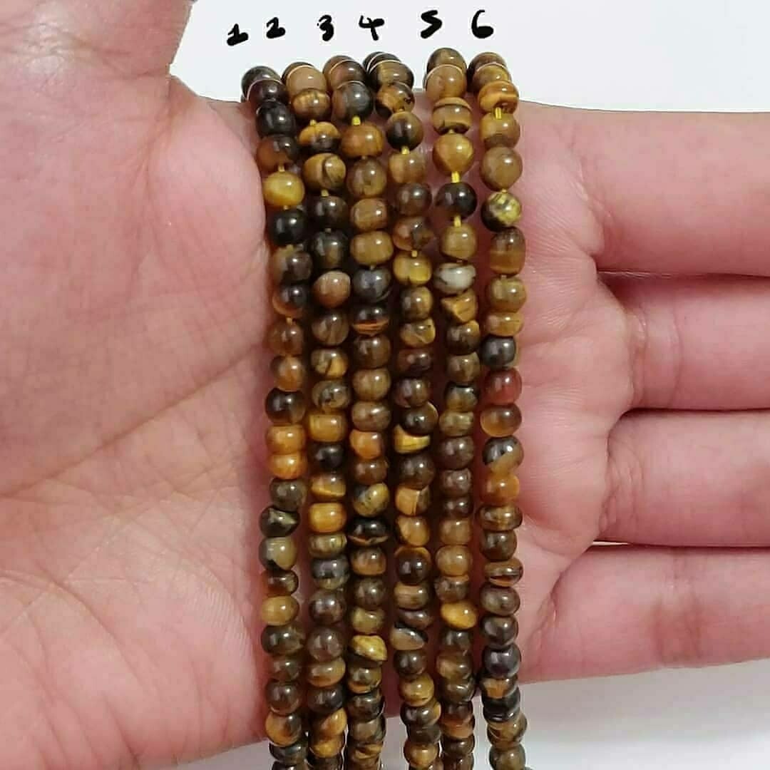 Natural Tiger Eye ROUND Bead Strand Strands are approx. 6.5 inch each in length. Bead size approx. 4 - 4.5mm each