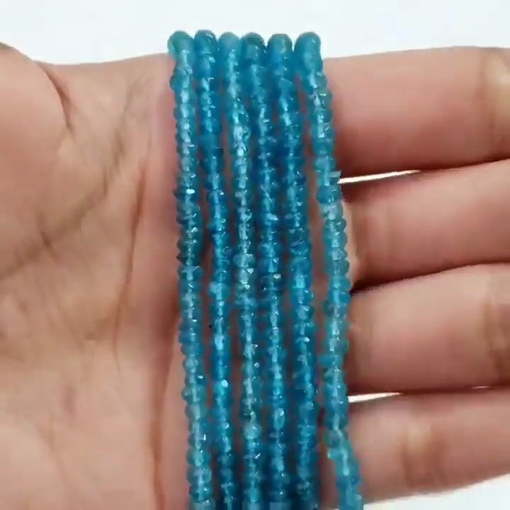 SPARKLING! Faceted Natural Neon Apatite Roundel Bead Strand Strands are approx. 6.5 inch each in length. Bead size approx. 2 - 3.5mm each