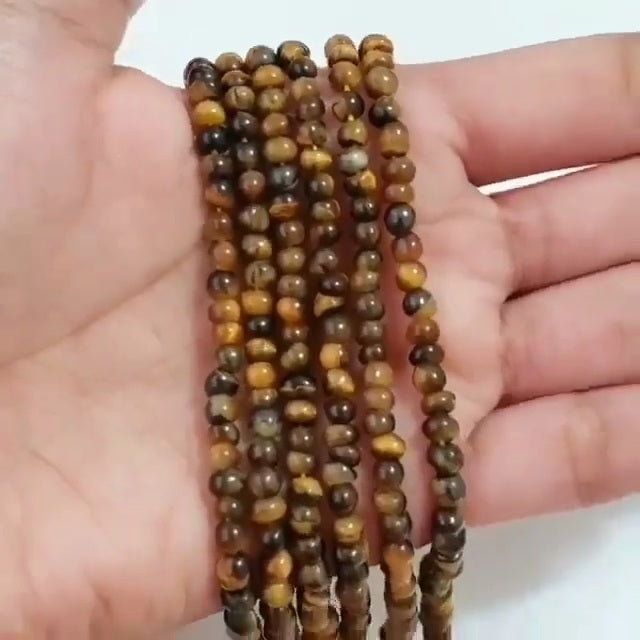 Natural Tiger Eye ROUND Bead Strand Strands are approx. 6.5 inch each in length. Bead size approx. 4 - 4.5mm each