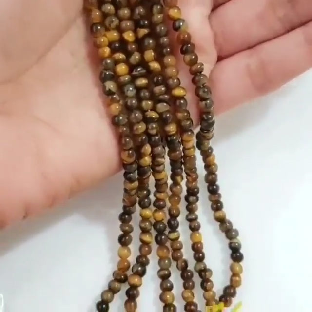 Natural Tiger Eye ROUND Bead Strand Strands are approx. 6.5 inch each in length. Bead size approx. 4 - 4.5mm each