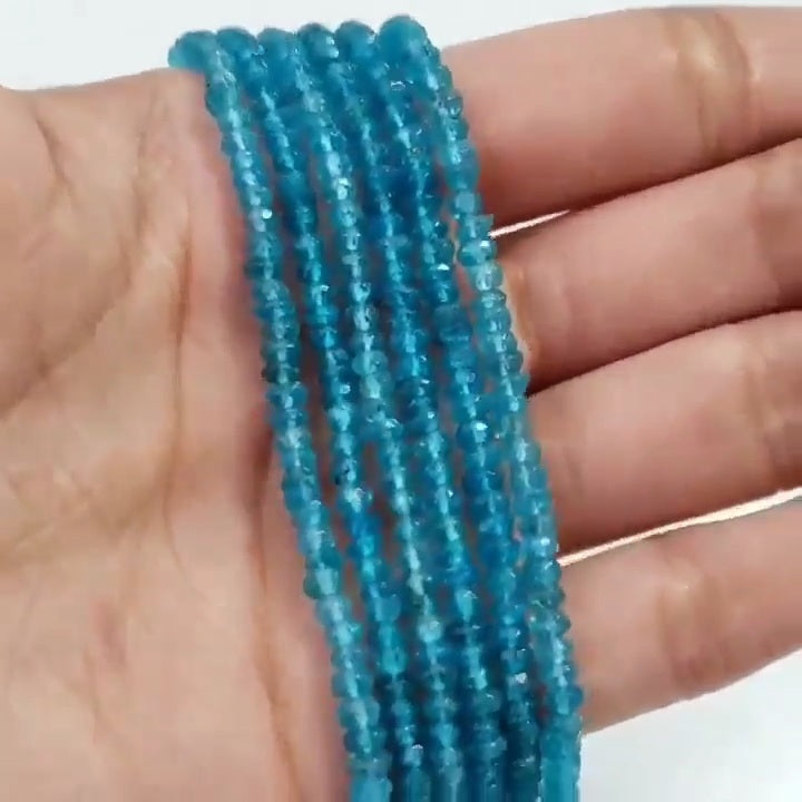 SPARKLING! Faceted Natural Neon Apatite Roundel Bead Strand Strands are approx. 6.5 inch each in length. Bead size approx. 2 - 3.5mm each