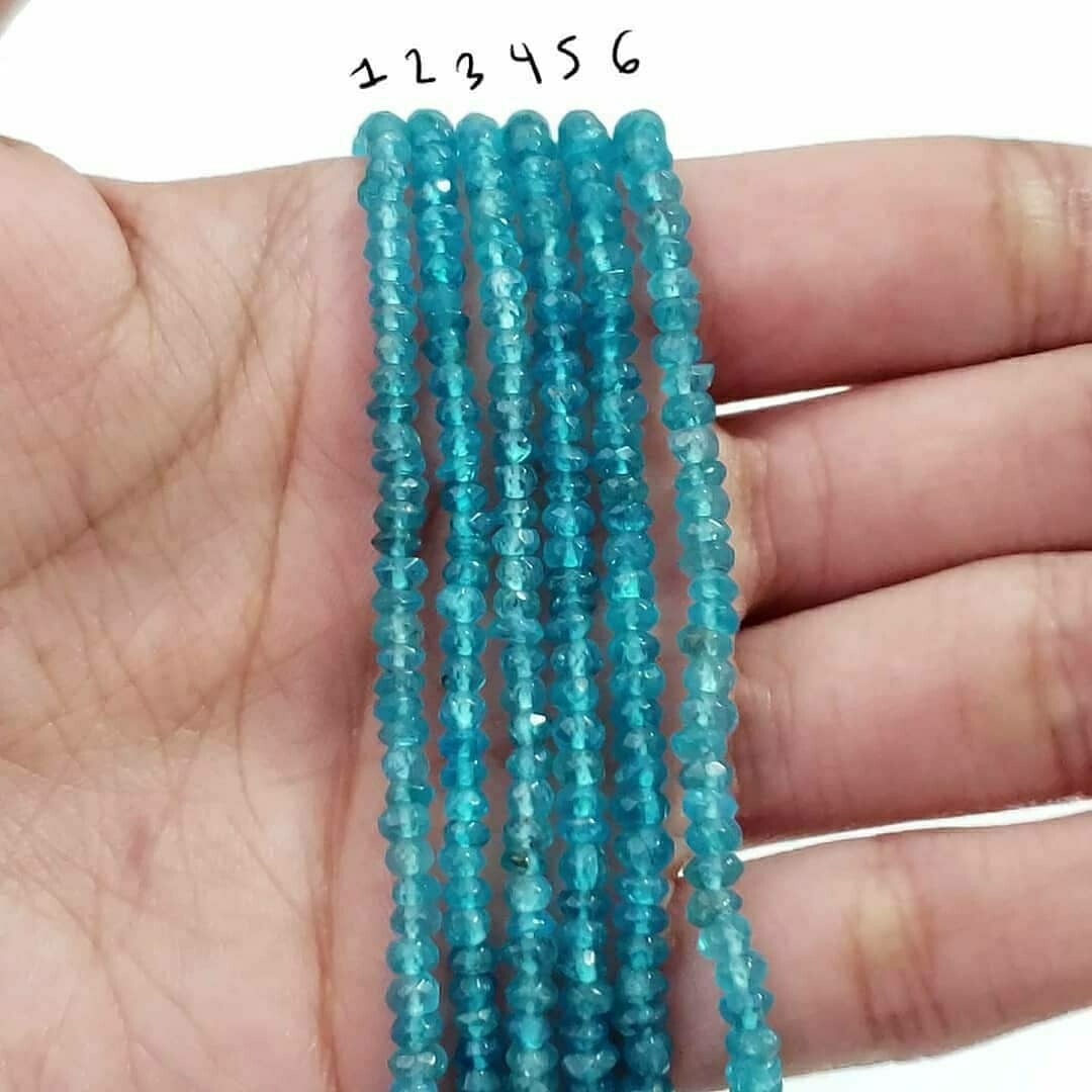 SPARKLING! Faceted Natural Neon Apatite Roundel Bead Strand Strands are approx. 6.5 inch each in length. Bead size approx. 2 - 3.5mm each