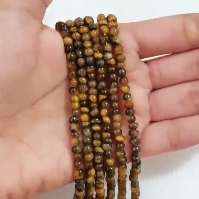 Natural Tiger Eye ROUND Bead Strand Strands are approx. 6.5 inch each in length. Bead size approx. 4 - 4.5mm each