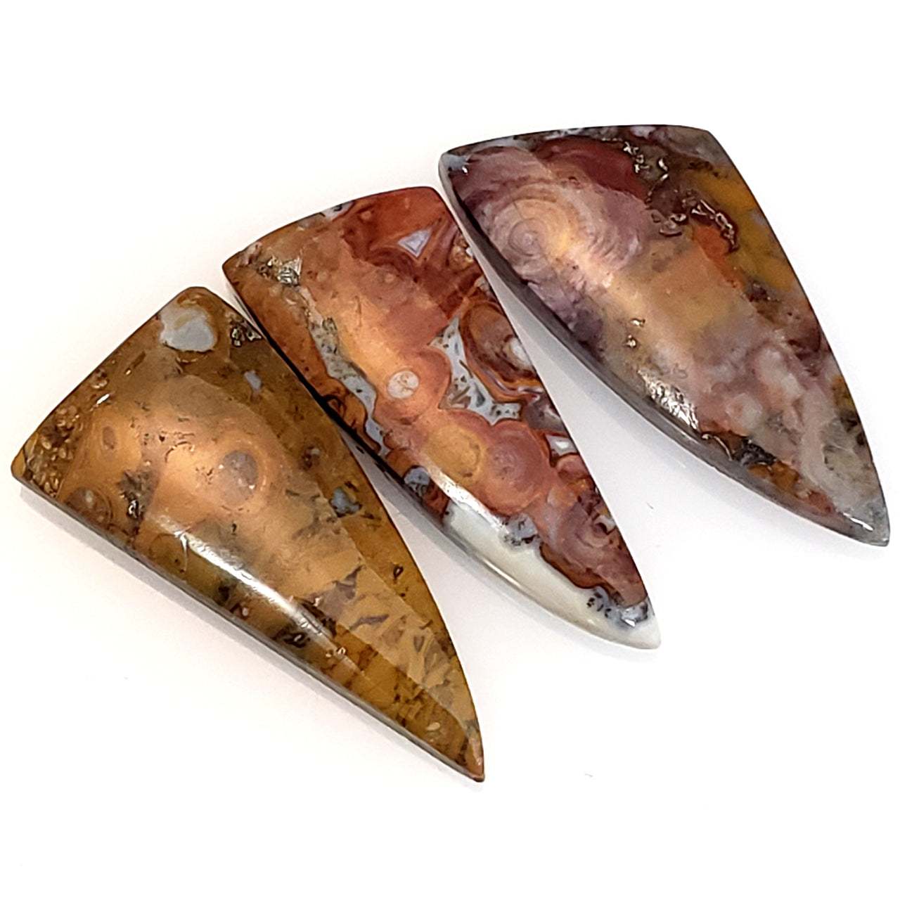 Natural Indonesian Red Palm Root Agate Cabochons Length range is approx. 26 to 28mm.