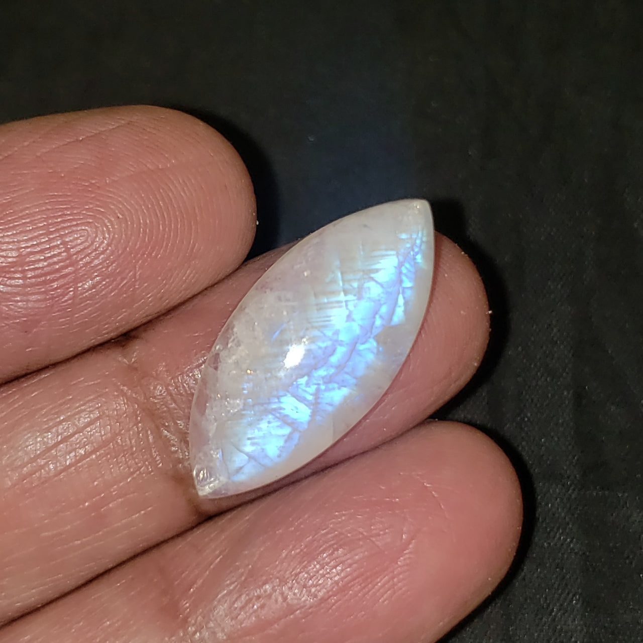 13Ct Natural Rainbow Moonstone Cabochon. Size- approx. 27x7mm