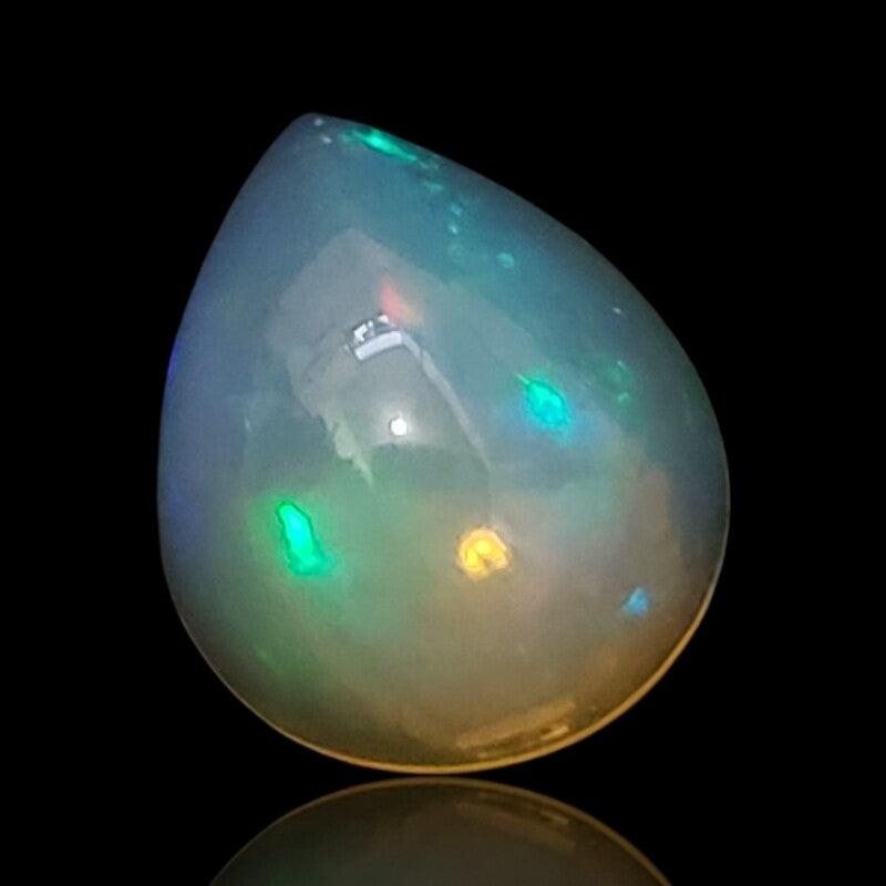 3Ct Natural Ethiopian Opal Cabochon. Size is approx. 12x10mm