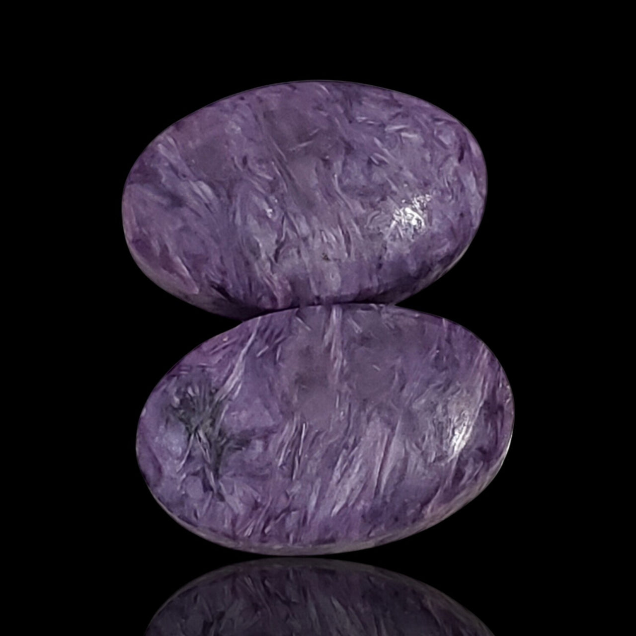 Natural Russian Charoite Oval Cabochon Pair. Size is approx. 19x12mm each.