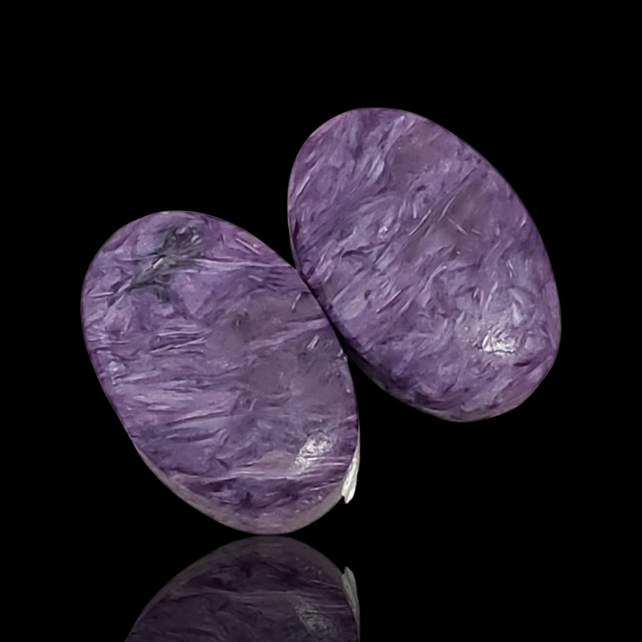 Natural Russian Charoite Oval Cabochon Pair. Size is approx. 19x12mm each.