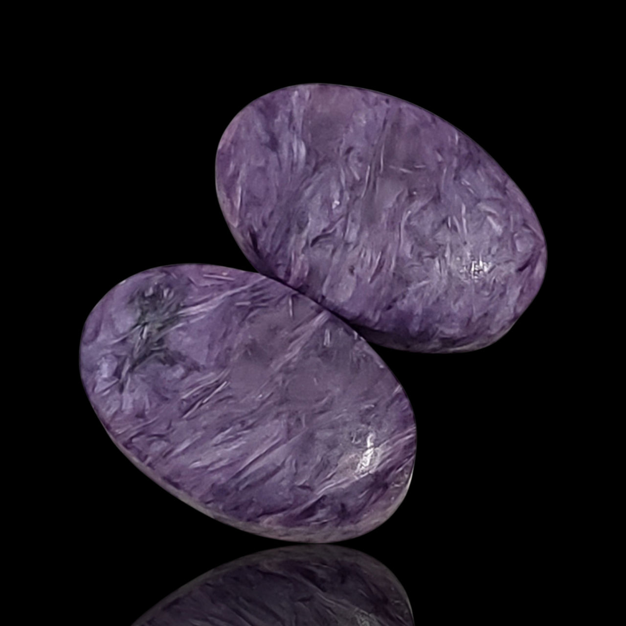 Natural Russian Charoite Oval Cabochon Pair. Size is approx. 19x12mm each.