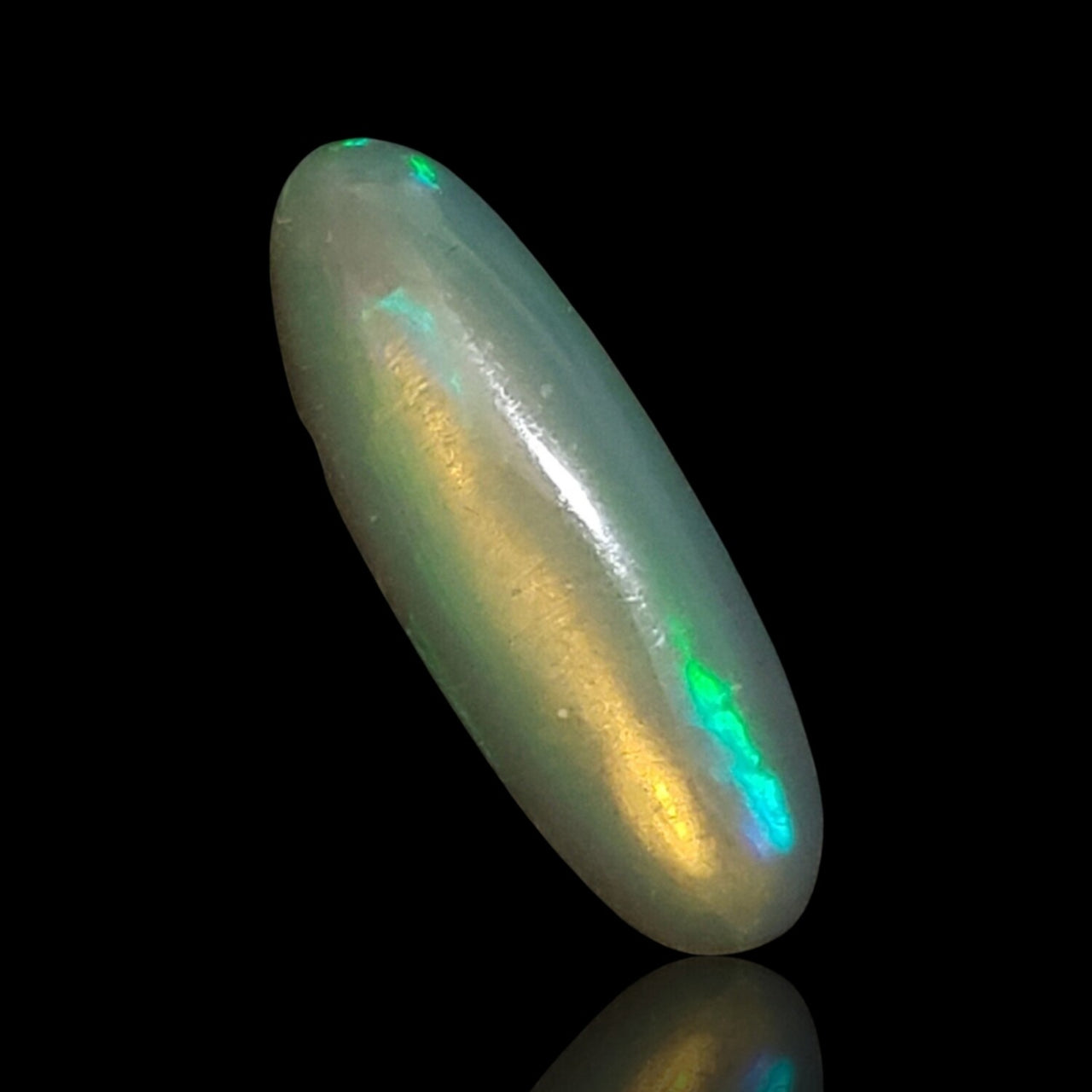 4.5Ct Natural Ethiopian Opal Cabochon. Size- approx. 24x8mm