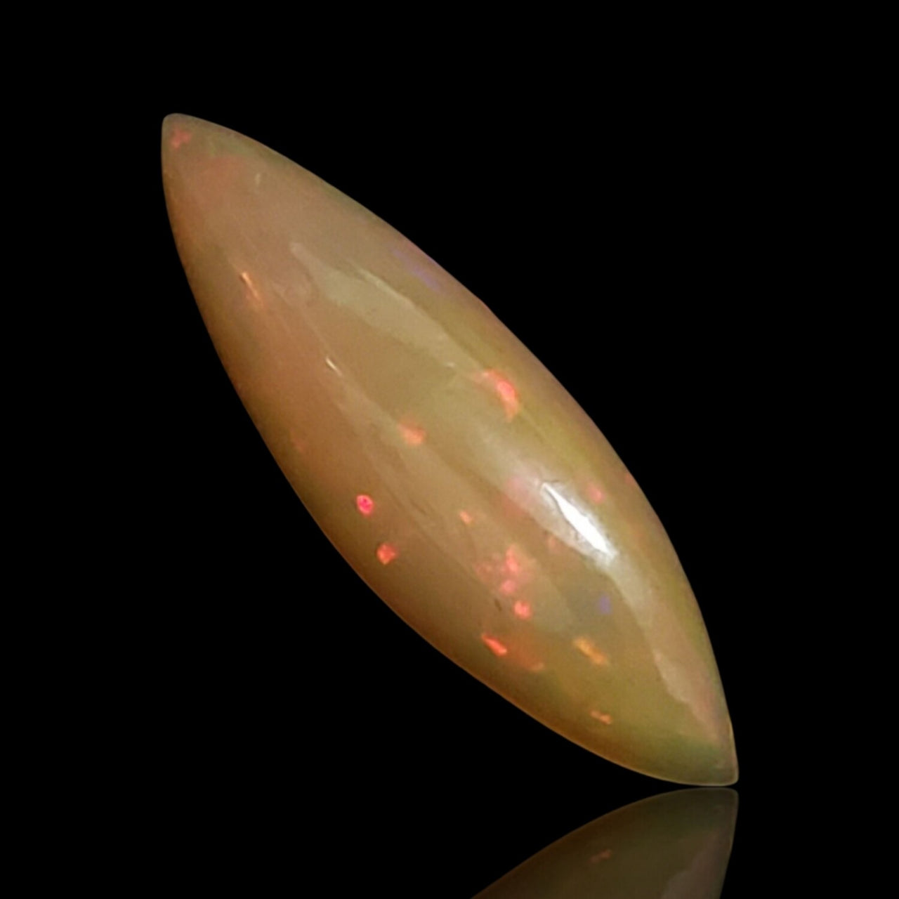 3Ct Natural Ethiopian Opal Cabochon. Size- approx. 22x7mm