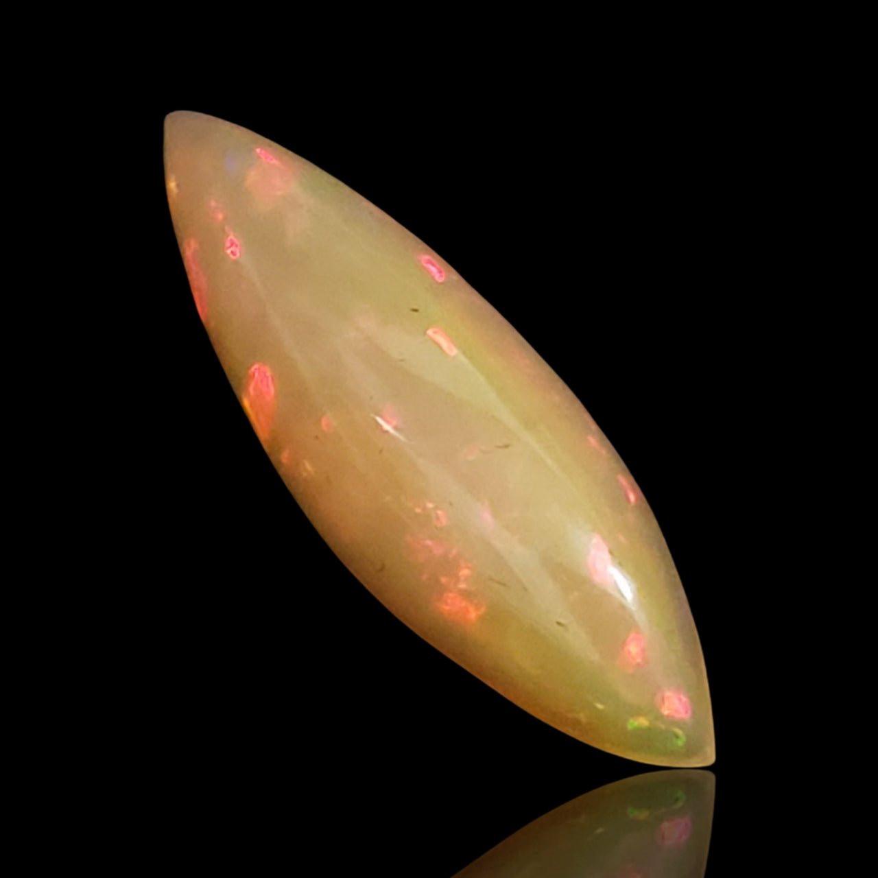 3Ct Natural Ethiopian Opal Cabochon. Size- approx. 22x7mm