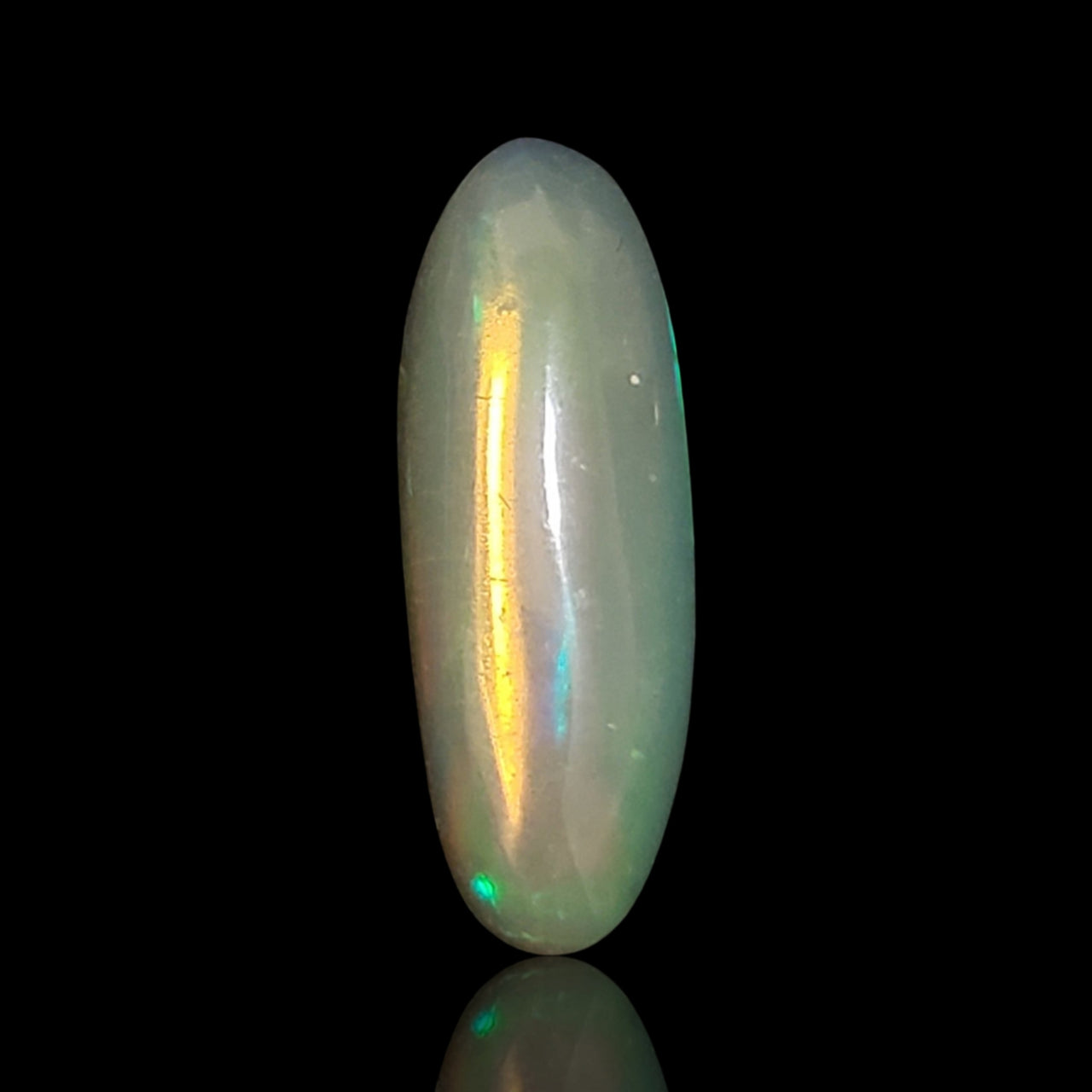 4.5Ct Natural Ethiopian Opal Cabochon. Size- approx. 24x8mm