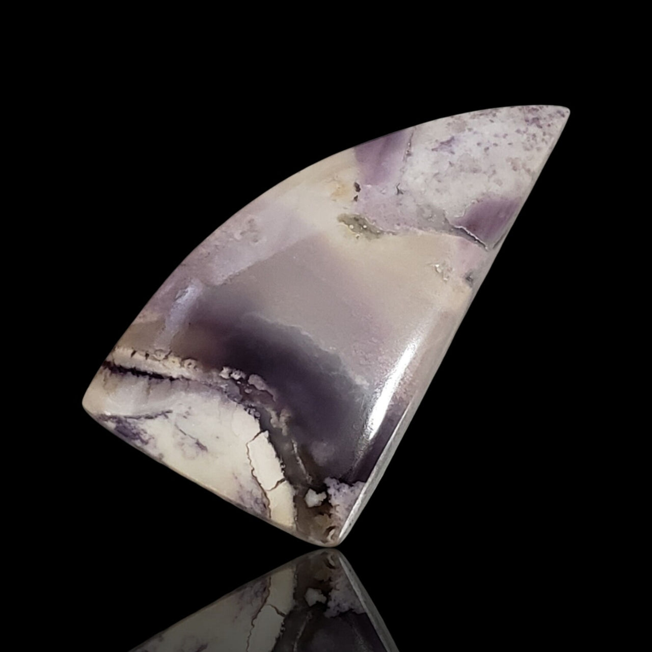 29Ct Natural Bertrandite/Morado Opal Cabochon. Size- approx. 38x21mm