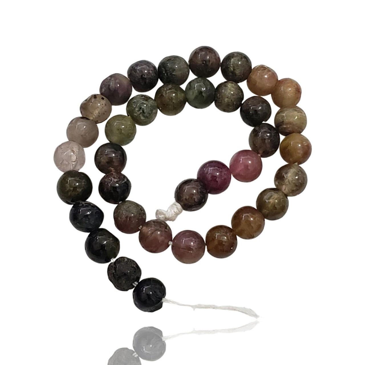 Natural Tourmaline Bead Strand. Strand is approx. 6.5inch in length. Bead size- approx. 5mm