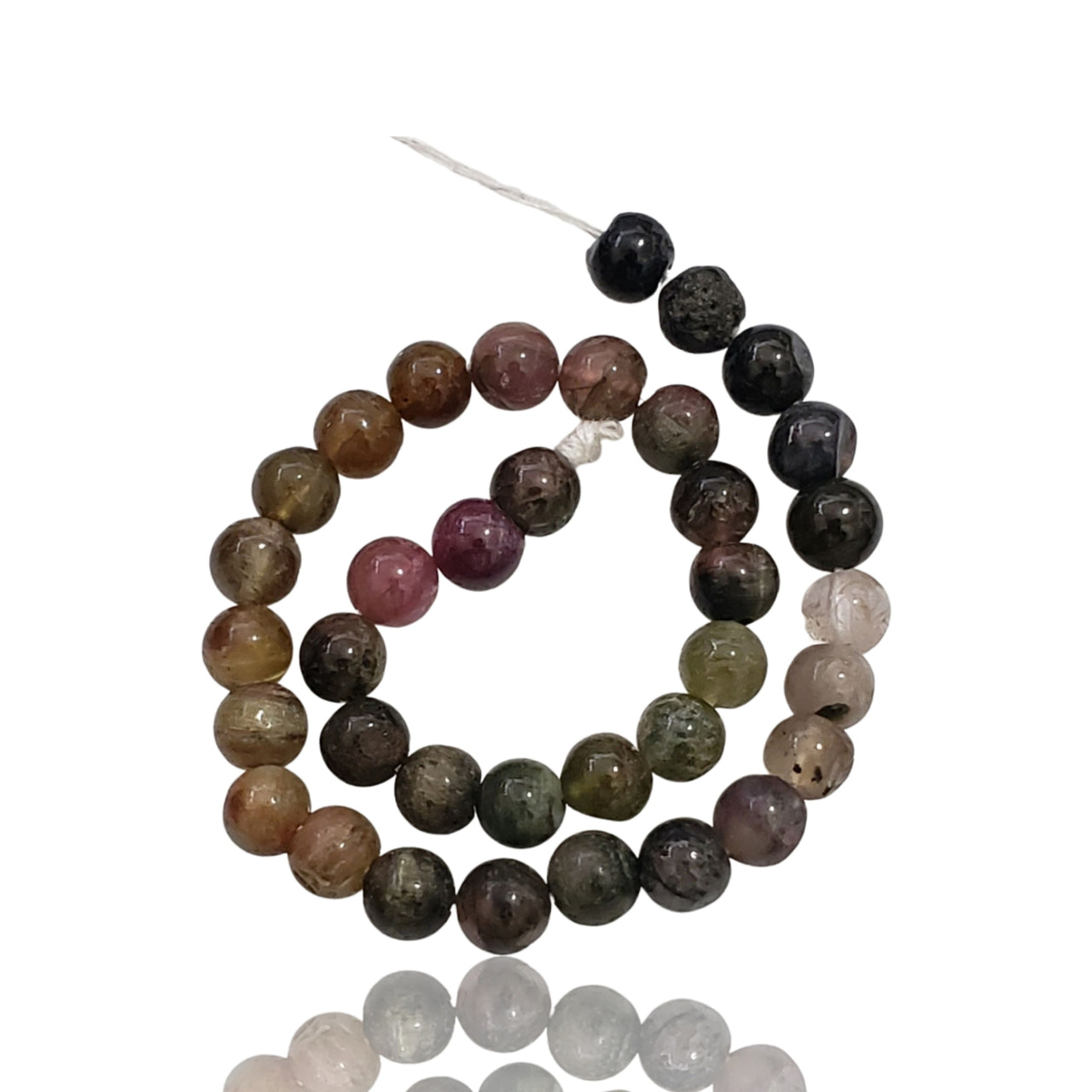 Natural Tourmaline Bead Strand. Strand is approx. 6.5inch in length. Bead size- approx. 5mm