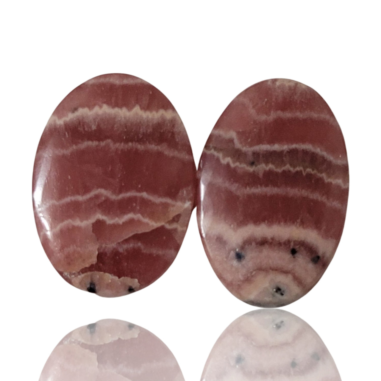 26Ct Natural Rhodochrosite Cabochon Pair. Size- approx. 21x14mm and 21x13mm