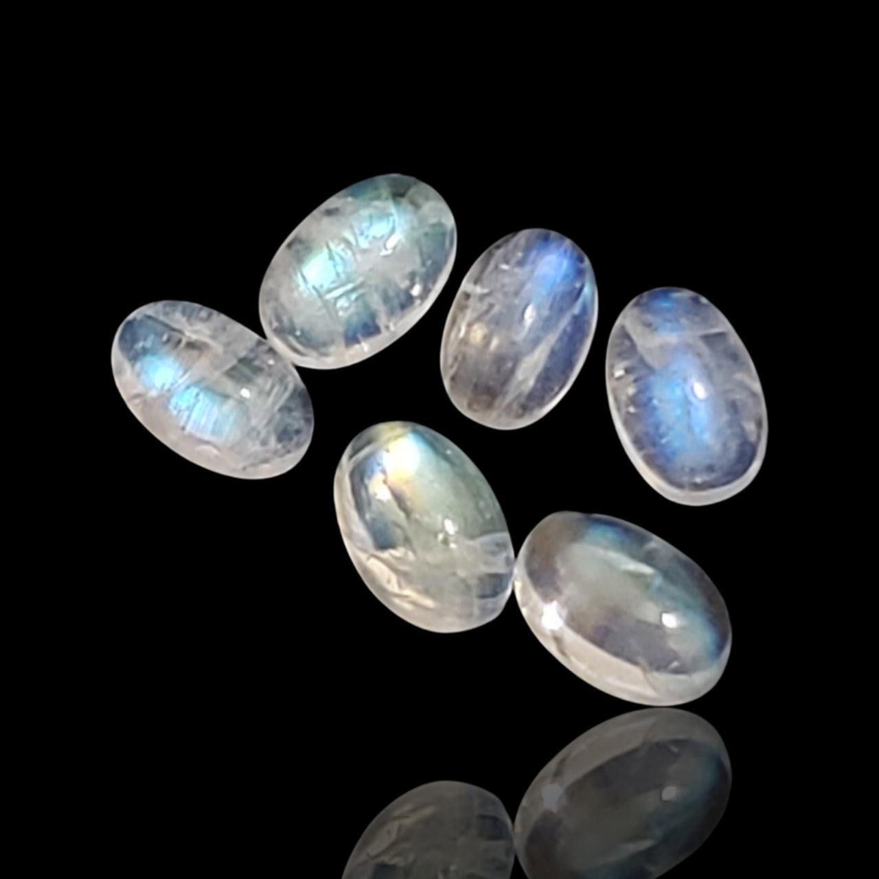 3.5Ct 6Pcs Natural Rainbow Moonstone Oval Cabochon Lot. Size- approx. 6x4mm each