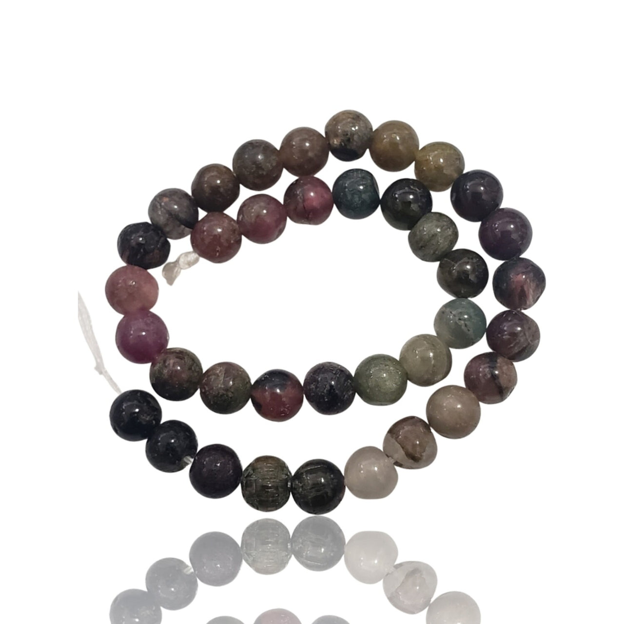 Natural Tourmaline Bead Strand. Strand is approx. 6.5inch in length. Bead size- approx. 5mm