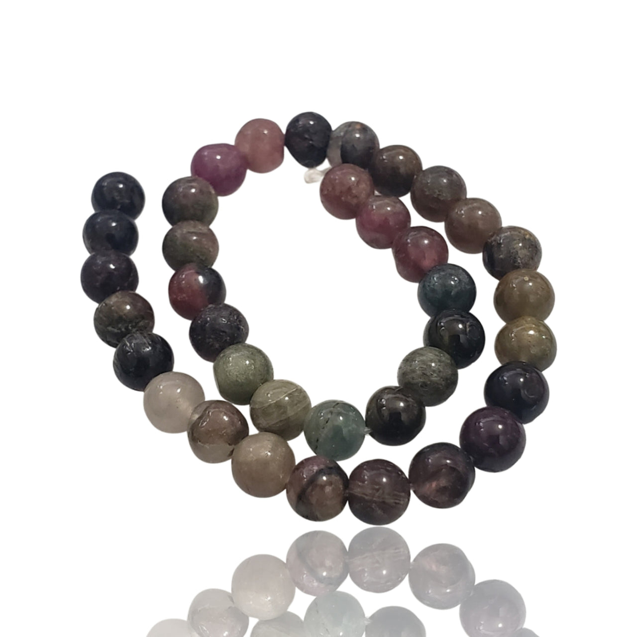 Natural Tourmaline Bead Strand. Strand is approx. 6.5inch in length. Bead size- approx. 5mm