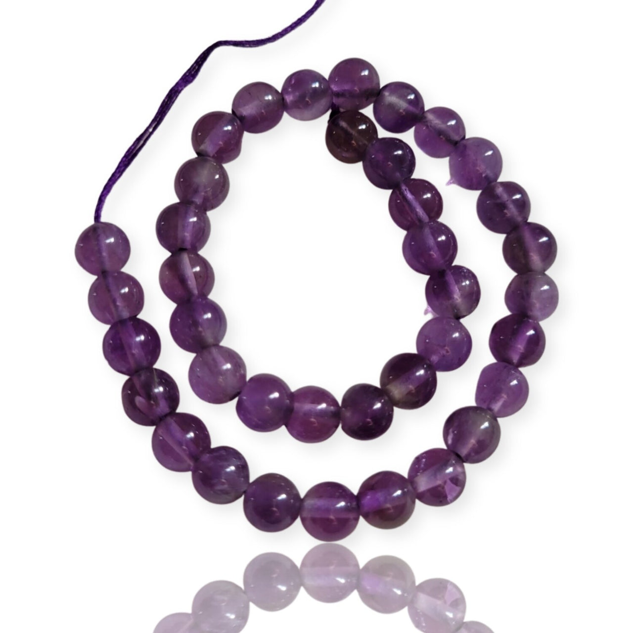 Natural Amethyst Round Bead Strand